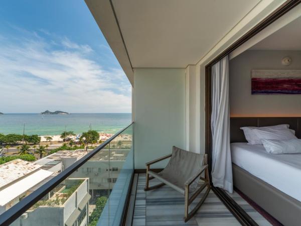 Lifestyle Laghetto Collection : photo 4 de la chambre chambre double deluxe - vue latérale sur mer