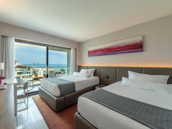 Lifestyle Laghetto Collection : photo 1 de la chambre chambre double deluxe - vue latérale sur mer