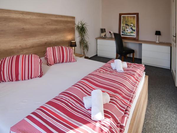 Stodolní Apartment : photo 1 de la chambre chambre double avec salle de bains commune