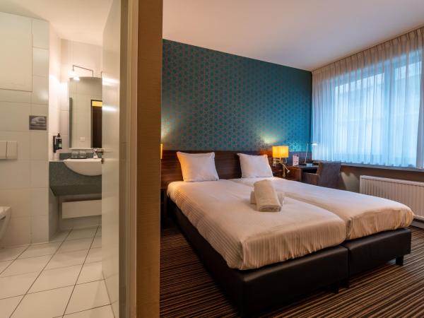 Hotel Docklands : photo 3 de la chambre chambre lits jumeaux - vue sur ville