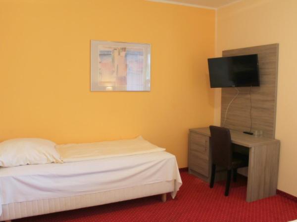 Hotel Lorien : photo 5 de la chambre chambre quadruple