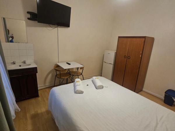 Bruce Rooms : photo 10 de la chambre chambre double - vue sur jardin