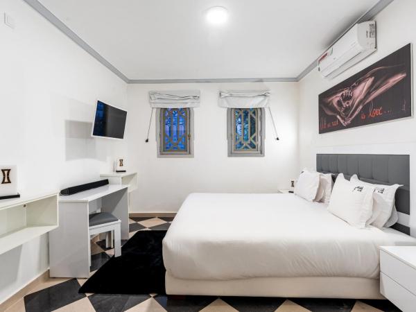 Riad Ushuaia La Villa - Centre Marrakech : photo 3 de la chambre chambre standard lit queen-size