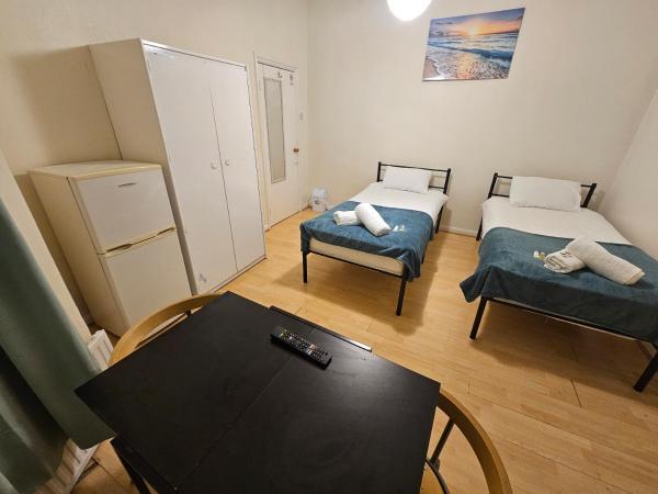 Bruce Rooms : photo 4 de la chambre chambre lits jumeaux