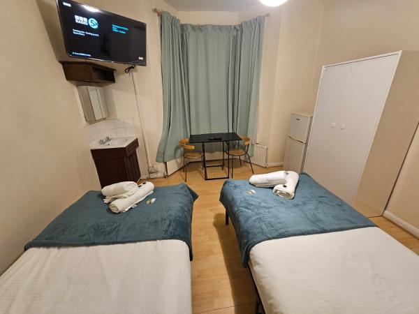 Bruce Rooms : photo 2 de la chambre chambre lits jumeaux