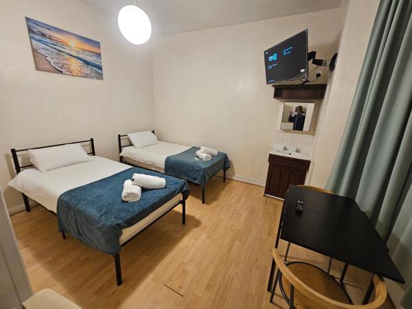 Bruce Rooms : photo 7 de la chambre chambre lits jumeaux