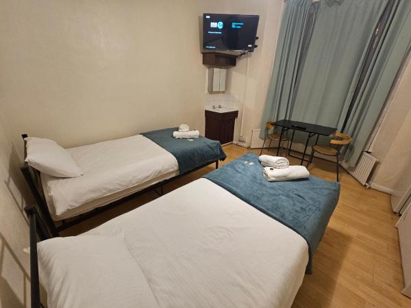 Bruce Rooms : photo 6 de la chambre chambre lits jumeaux