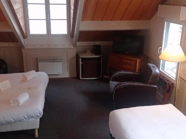 Le Querrien : photo 4 de la chambre chambre double avec lit d'appoint