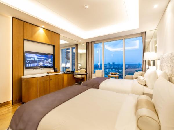 The Leela Bhartiya City Bengaluru : photo 3 de la chambre chambre lits jumeaux