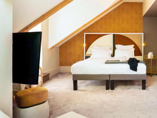 Le Saint Gervais Hotel & Spa Handwritten Collection : photo 2 de la chambre suite double junior avec canapé-lit double