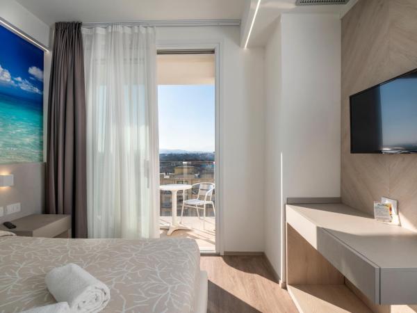 Hotel Harmony : photo 5 de la chambre chambre triple deluxe