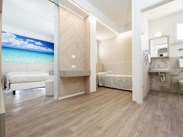 Hotel Harmony : photo 4 de la chambre chambre triple deluxe