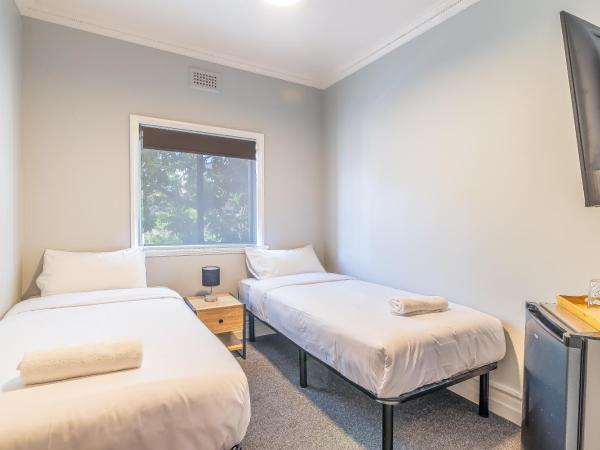 K2 Brisbane : photo 1 de la chambre chambre lits jumeaux avec salle de bains commune