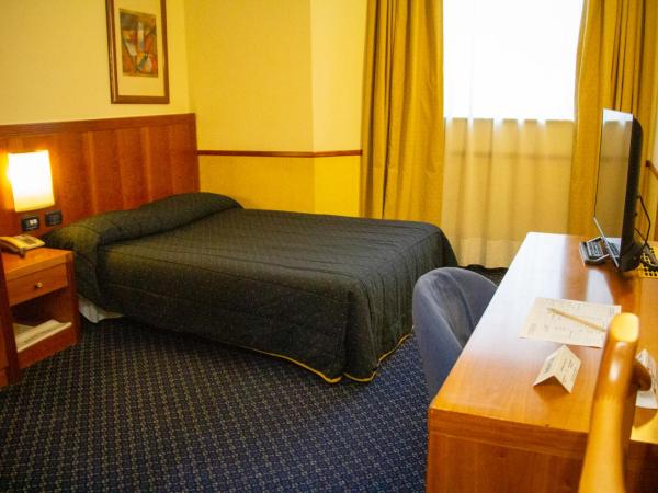 Pacific Hotel Fortino : photo 4 de la chambre petite chambre double