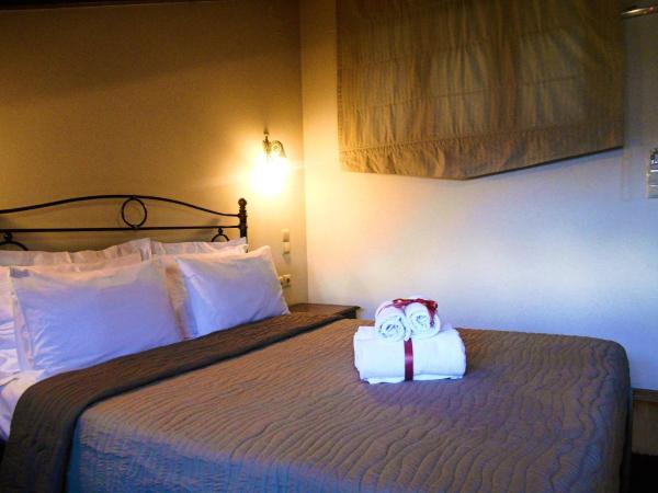 Siarava : photo 1 de la chambre chambre double ou lits jumeaux deluxe - vue sur lac