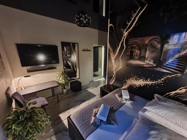 Apartament z jacuzzi Kraków Rynek : photo 6 de la chambre suite lit king-size avec baignoire spa