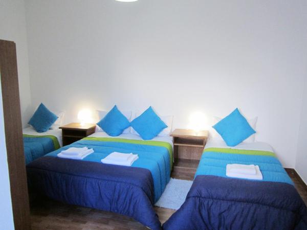 Alojamento Local Duarte's : photo 2 de la chambre chambre quadruple avec salle de bains privative