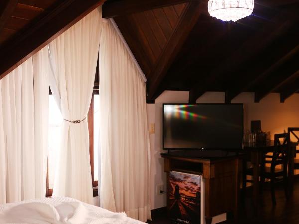 Johnscher by SJ - San Juan Curitiba : photo 9 de la chambre suite lit king-size
