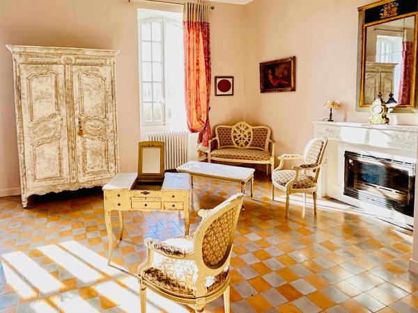 Chambres d'hotes le Domaine de Romanil : photo 6 de la chambre chambre lit king-size supérieure