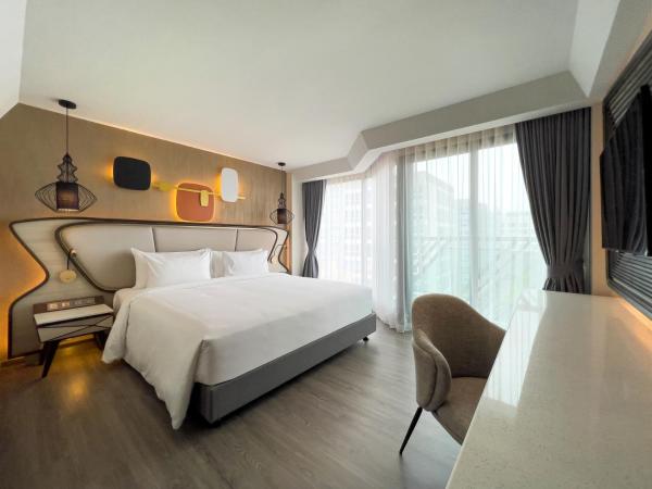 Amethyst Hotel Pattaya : photo 1 de la chambre chambre lit king-size deluxe