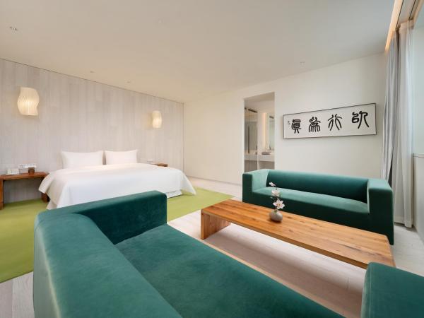 Chengdu Chengshe Hotel - Wenjiang University Town Southwest Caida Branch : photo 2 de la chambre ruogu deluxe suite with bathtub