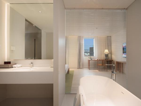 Chengdu Chengshe Hotel - Wenjiang University Town Southwest Caida Branch : photo 1 de la chambre rorong executive suite with bathtub