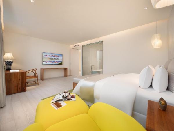 Chengdu Chengshe Hotel - Wenjiang University Town Southwest Caida Branch : photo 3 de la chambre rorong executive suite with bathtub