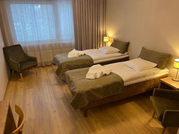 Backbyn Kartano : photo 1 de la chambre chambre lits jumeaux