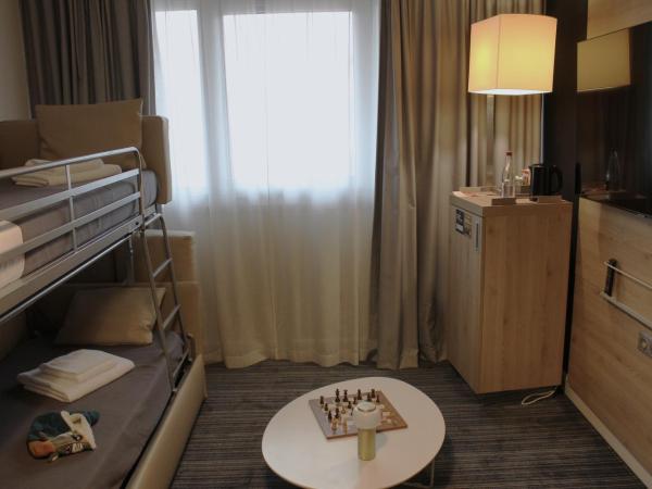 Mercure Toulouse Centre Saint-Georges : photo 5 de la chambre appartement privilège avec 1 lit double et canapé 
