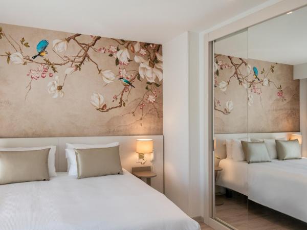 Résidence Hôtelière Chambord au coeur de Menton - entièrement rénovée : photo 2 de la chambre suite deluxe