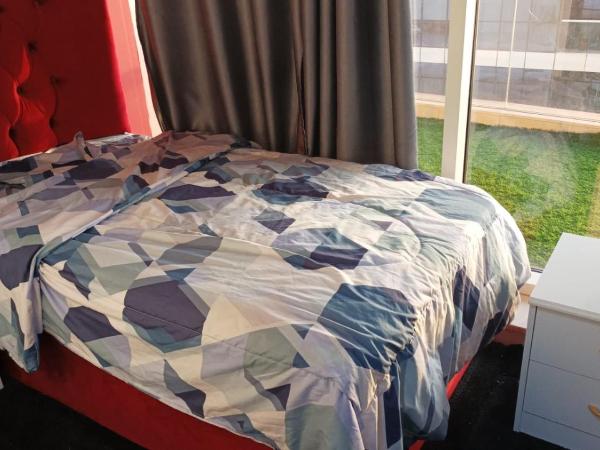 Paz Holiday Luxurious Space : photo 2 de la chambre chambre simple - vue sur jardin