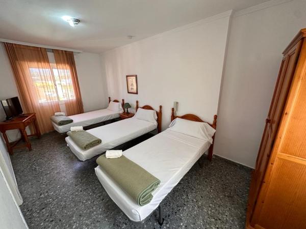 Hostal San Felipe : photo 3 de la chambre chambre triple