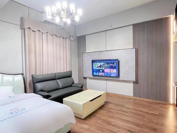 广州沃家国际公寓 : photo 3 de la chambre chambre triple avec balcon