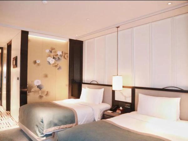 JiuTai Hotel Hangzhou : photo 1 de la chambre chambre lit king-size ou lits jumeaux supérieure