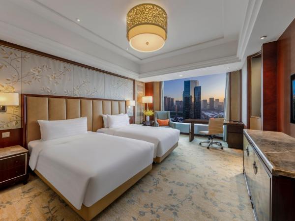 Shangri-La Shenyang : photo 1 de la chambre chambre lits jumeaux deluxe - vue sur ville