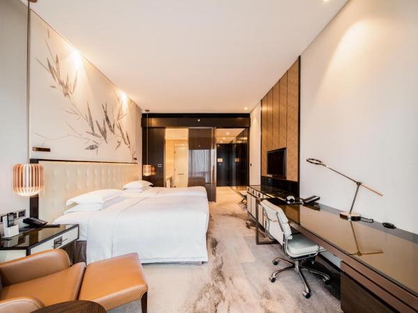 Hilton Shenzhen Futian, Metro Station at Hotel Front Door, Close to Futian Convention & Exhibition Center : photo 1 de la chambre chambre lits jumeaux exécutive - accès au salon