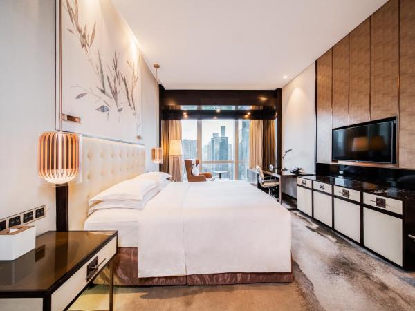 Hilton Shenzhen Futian, Metro Station at Hotel Front Door, Close to Futian Convention & Exhibition Center : photo 5 de la chambre chambre lit king-size exéctive - accès au salon