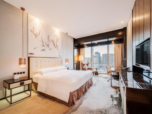 Hilton Shenzhen Futian, Metro Station at Hotel Front Door, Close to Futian Convention & Exhibition Center : photo 1 de la chambre chambre lit king-size