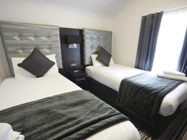 The 29 London : photo 2 de la chambre chambre lits jumeaux avec toilettes et douche
