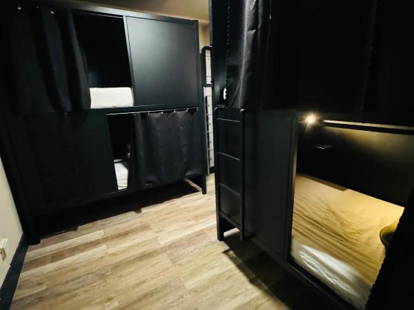 KAMA CENTRAL PARK : photo 1 de la chambre lit simple dans dortoir pour hommes avec salle de bains commune