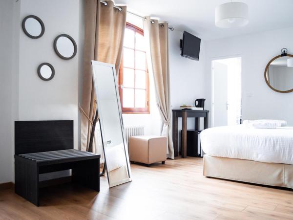 Hôtel Le Tivoli : photo 2 de la chambre suite