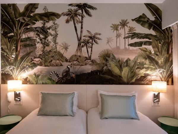 Résidence Hôtelière Chambord au coeur de Menton - entièrement rénovée : photo 2 de la chambre chambre lits jumeaux deluxe