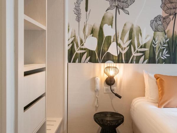 Résidence Hôtelière Chambord au coeur de Menton - entièrement rénovée : photo 5 de la chambre chambre lits jumeaux deluxe