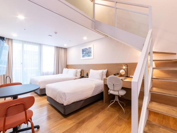 New Seoul Hotel Myeongdong : photo 2 de la chambre suite en duplex