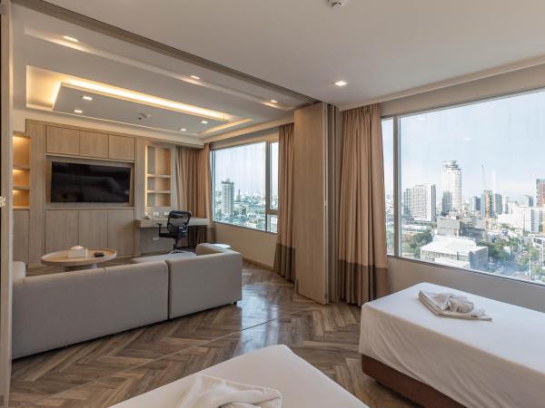 Jasmine Grande Residence : photo 8 de la chambre suite 2 chambres avec jacuzzi