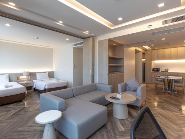 Jasmine Grande Residence : photo 2 de la chambre suite 2 chambres avec jacuzzi