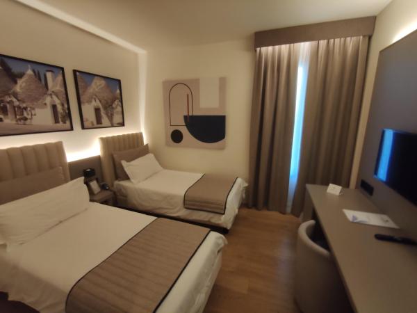 Vittoria Parc Hotel : photo 5 de la chambre chambre lits jumeaux