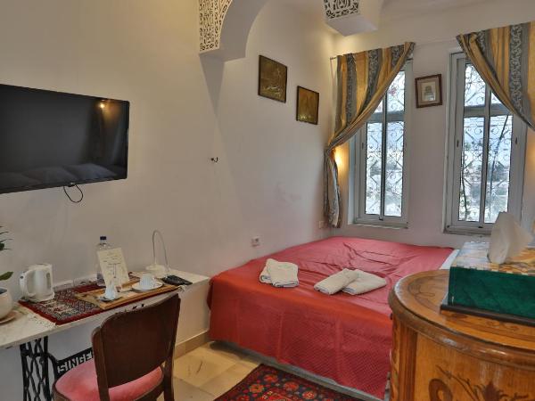Dar Souad : photo 1 de la chambre chambre double avec salle de bains privative