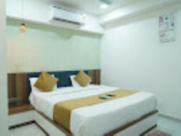 Hotel Rest And View , Ahmedabad : photo 1 de la chambre chambre lits jumeaux deluxe