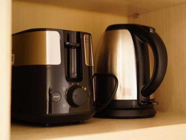 Crowne Plaza Bangkok Parc Lumpini : photo 6 de la chambre chambre lit king-size premium avec kitchenette